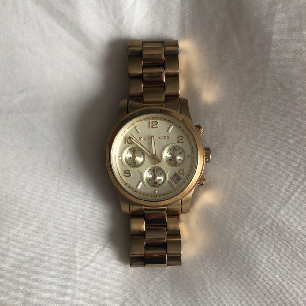 Authentic Michael Kors gold watch